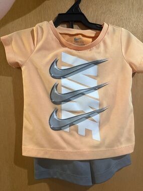 Nike Peach Short-Sleeve Dri-FIT Tee with Silver Swooshes